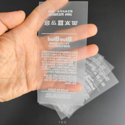 Garment Heat Transfer Care Labels On Fabric In Silver Color